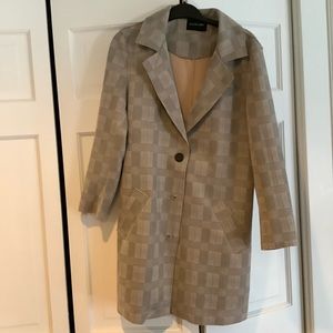 Flattering and on trend Dolce Cabo topper